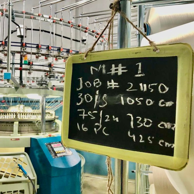Circular knitting machine in operation